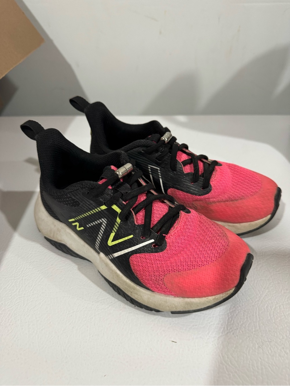 New Balance Kids Pink and Black Athletic Sneakers